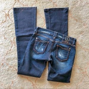 Guess Flared Jeans with Peace detail☮️ on the back